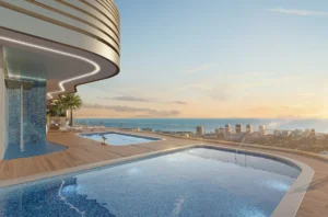 Rooftop pool sunrise en Andare Residences by Pininfarina con vistas panorámicas al océano y skyline de Fort Lauderdale